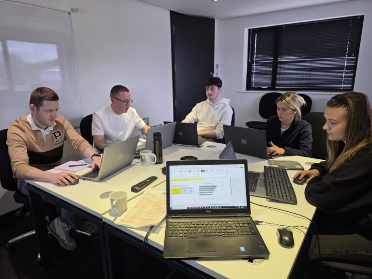 Delegates working through Excel exercises on an onsite course