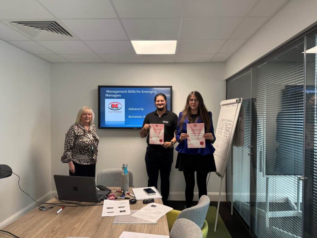 Attendees receiving their Keys Training course certificates